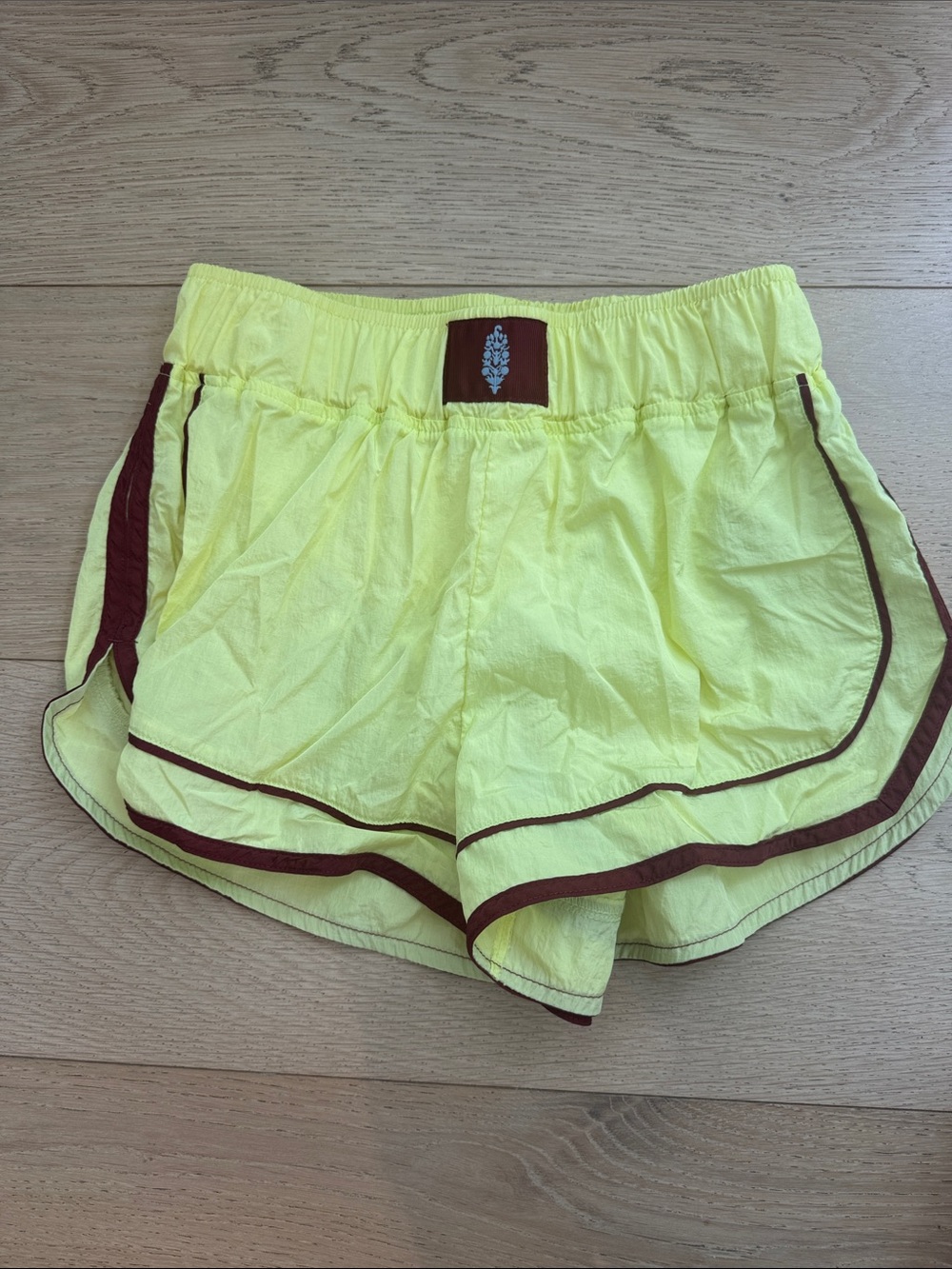 FP Movement by Free People Neon Yellow Athletic Shorts with Brown Trim